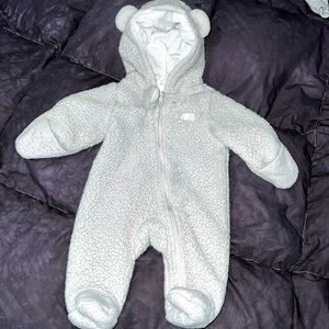 Gray fluffy onesie with hoodie.